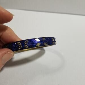 Blue glitter/rhinestone studded gold tone 2 1/2" bangle brac